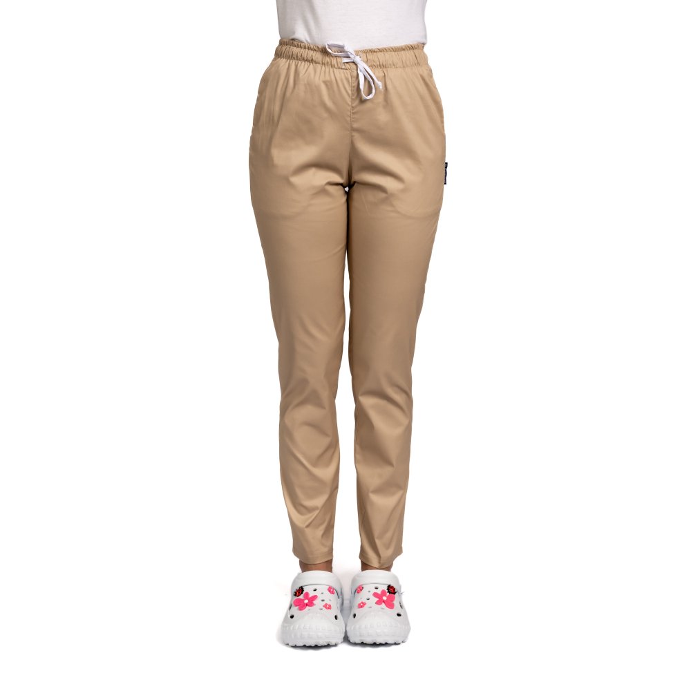 Krémszínű, elasztánnal átkötött orvosi nadrág, női modell, húzózsinórral és két oldalsó zsebbel.